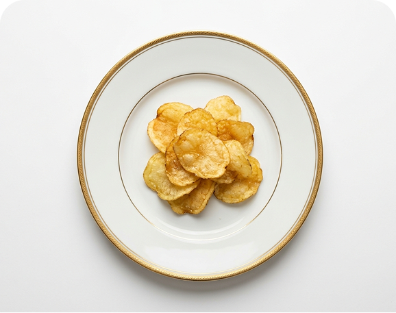 Chips Chipsy King Poulet & Estragon dressées sur assiette